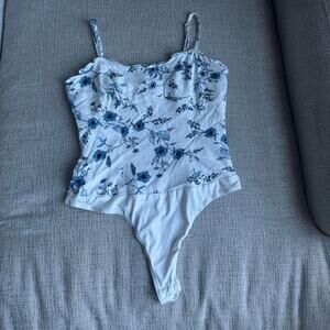 White and blue floral bodysuit